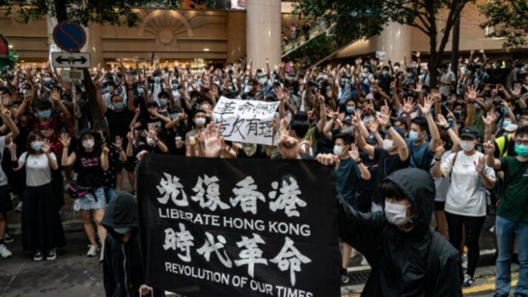 Hong Kong bans protest movement’s rallying cry for ‘revolution’