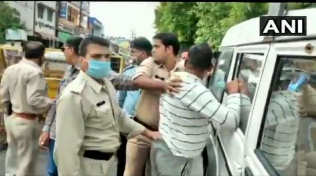 A screenshot from UP gangster Vikas Dubey's arrest in Ujjain, MP, earlier this week | Courtesy: ANI