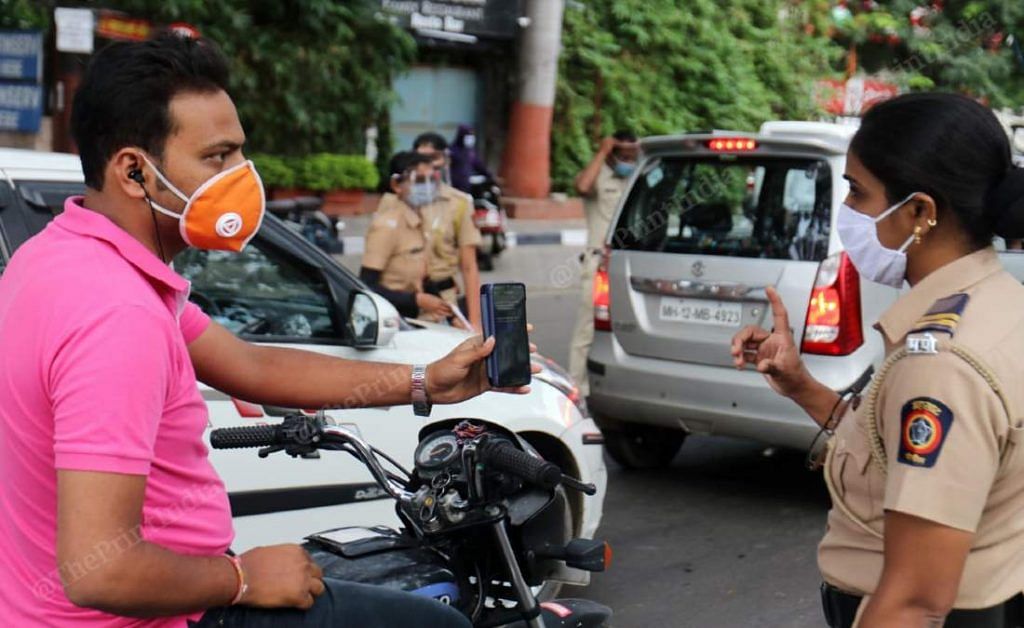A Pune policewoman manages traffic amid lockdown restrictions in Pune | Representational image | Vasant Prabhu | ThePrint
