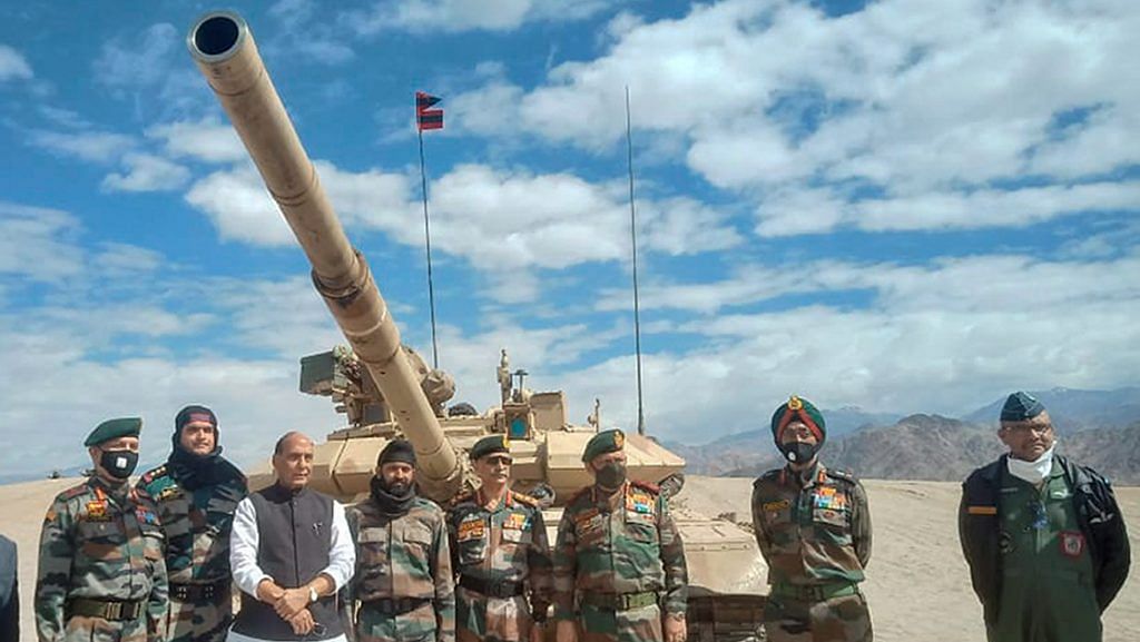 Defence Minister Rajnath Singh poses with officers at a forward base in Ladakh, 17 July | PTI