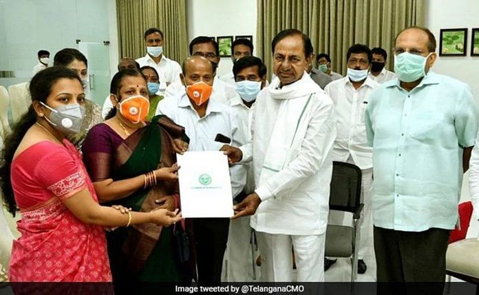 Colonel Santosh Babu's wife Santoshi being handed lettter of appointment as Deputy Collector by CM K Chandrashekar Rao in Hyderabad Wednesday, 22 July 2020. | Twitter/Telangana CMO