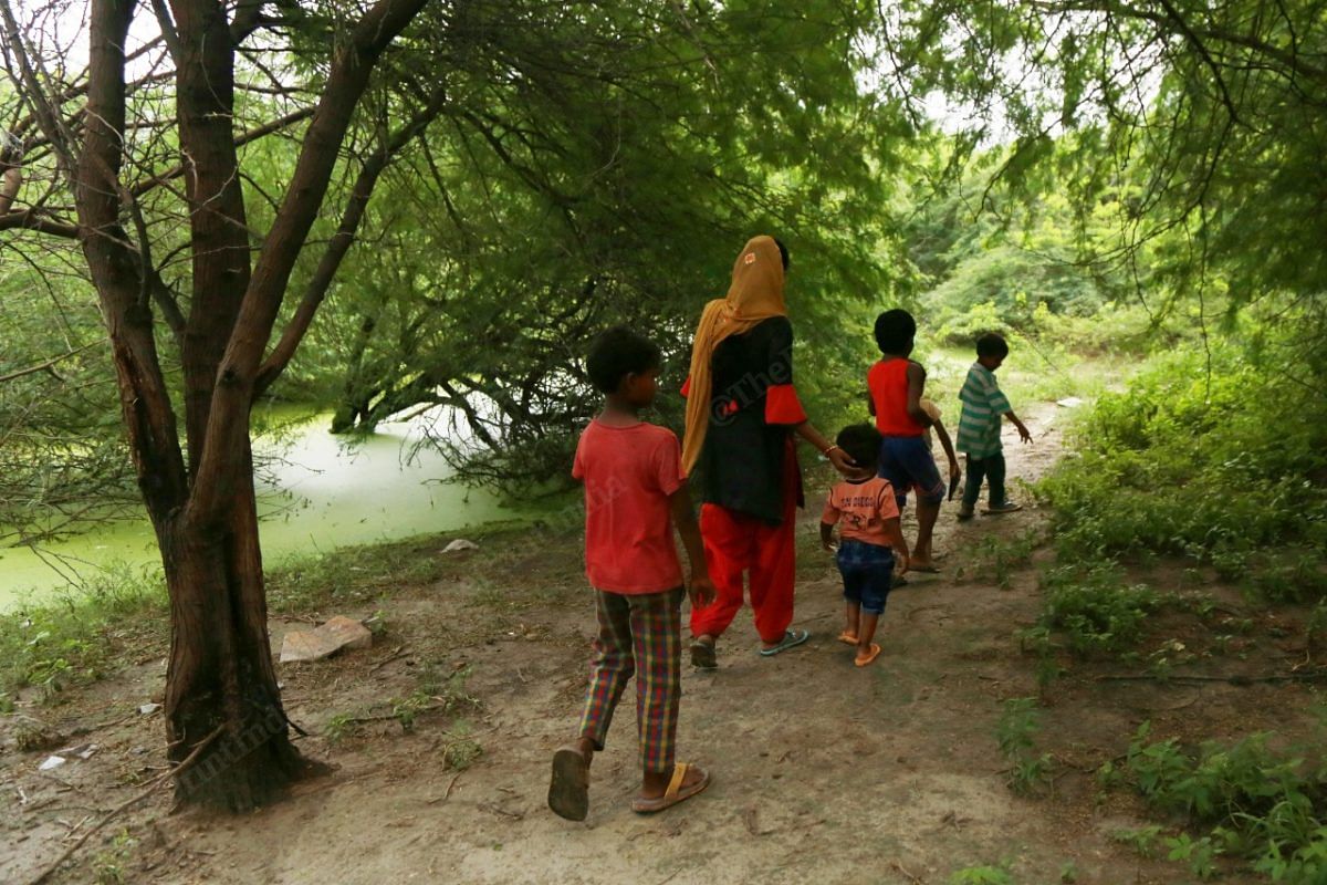 The homes in the village are scattered all over, families take these undefined paths through the jungle | Photo: Manisha Mondal | ThePrint