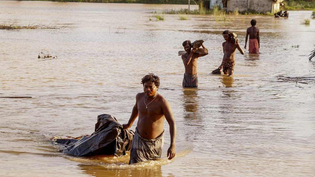 Flood affects daily life in Odisha | PTI