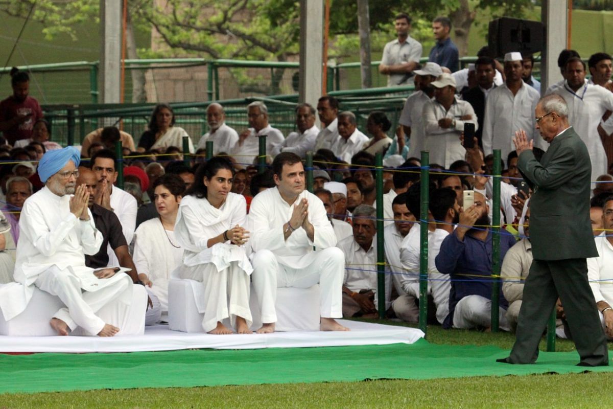 Pranab Mukherjee greets Congress leaderr Manmohan Singh left and Rahul Gandhi right | Photo: Praveen Jain | ThePrint