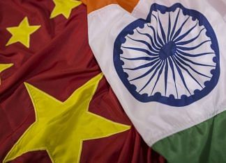 The national flags of China and India (Representational Image) | Photo: Dhiraj Singh | Bloomberg