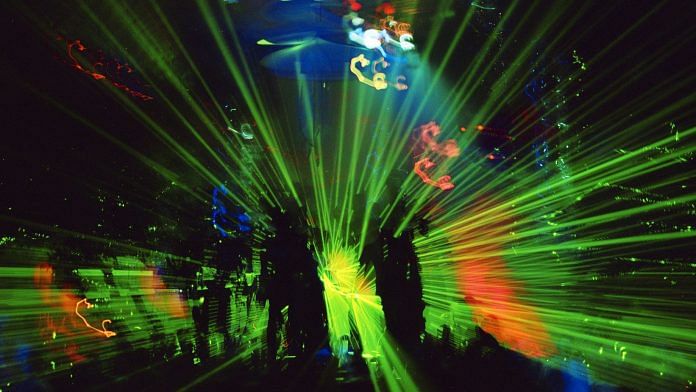 A laser light show at Amnesia, a nightclub in Ibiza | Photographer: Leelu | Bloomberg via Getty Images