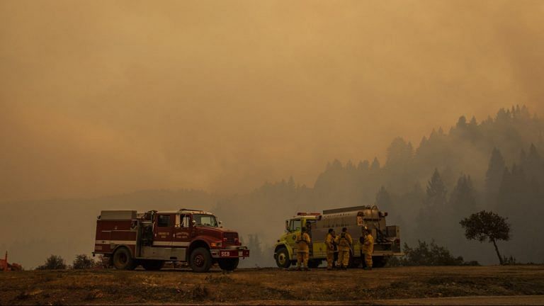 California fights ‘historic’ fires as 1.4 million acres burn in more than 7,000 blazes