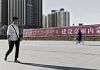 A woman walks through the main square in Baotou, Inner Mongolia, China, on 11 August 2020 (representational image) | Qilai Shen | Bloomberg