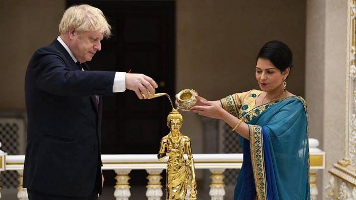 This photo of UK PM Boris Johnson and Home Secretary Priti Patel was posted to Twitter on 7 August | Facebook