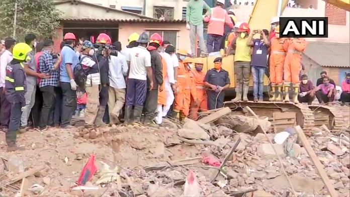 Rescue work underway at the building collapse in Mahad, Raigad district, makes it impossible for social distancing norms to be followed | ANI