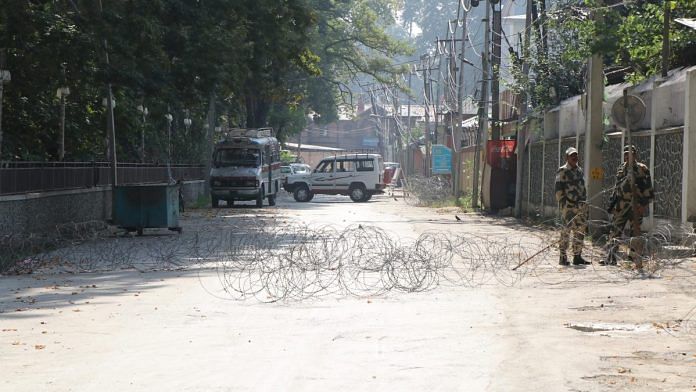 Security forces cordon off the road leading to the office of the PDP in Srinagar | By special arrangement