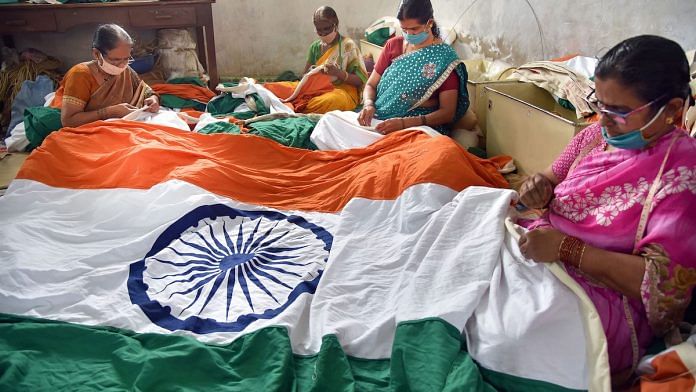 Representational image | Women stitch the Indian national flag for Independence Day, at Khadi Gramodyog Samyukta centre, Hubli | PTI