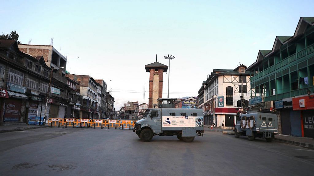 CRPF vehicles stationed at Lal Chowk on the first day of the two-day curfew in Srinagar, Tuesday, 4 Aug 2020 | PTI