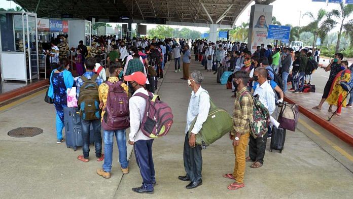 Migrant workers queue up at the Birsa Munda Airport in Ranchi on 14 August | Photo: ANI