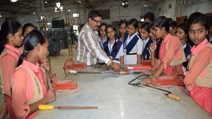 A guest faculty member teaches school girls and students of the fitter trade at Government ITI, Berhampur, Odisha | By special arrangement