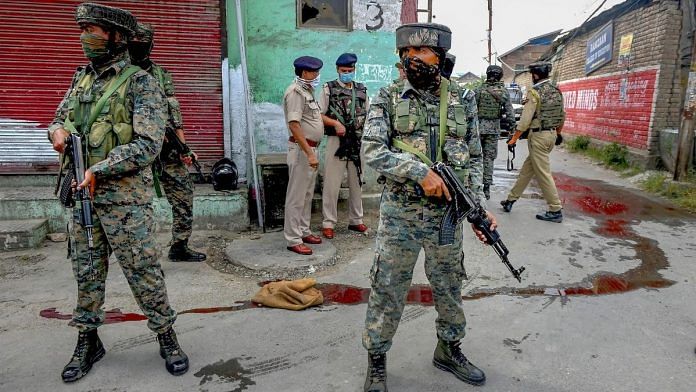 Security personnel stand guard at the spot after a militant attack, at Nowgam bypass in Srinagar, Friday, Aug 14, 2020 | PTI