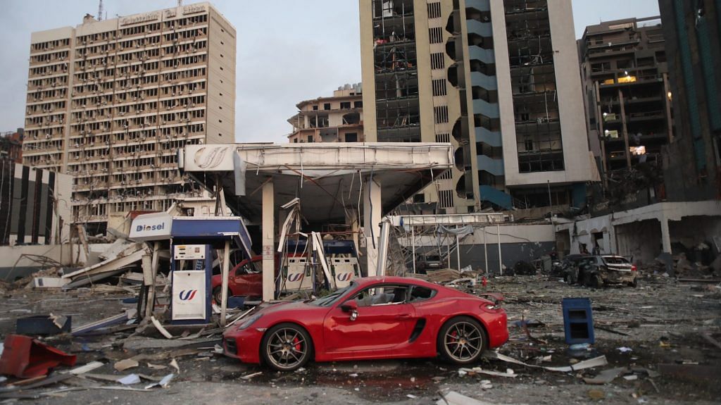 A vehicle sits at a damaged gas station following the explosion at the Port of Beirut in Beirut, Lebanon, on 4 August | Photo: Hasan Shaaban | Bloomberg