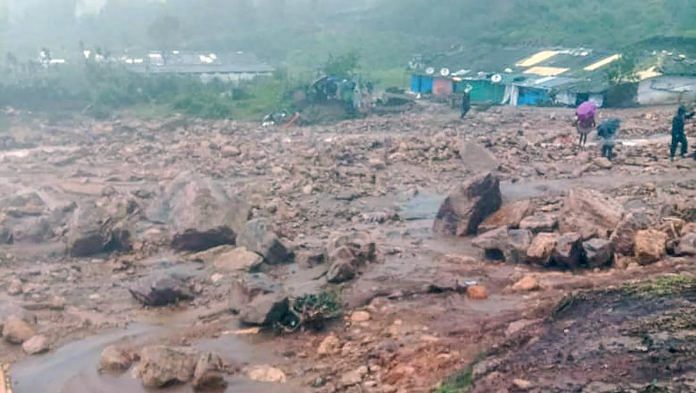 Debris on the ground after a landslide due to heavy rainfall in Idukki district on 7 August