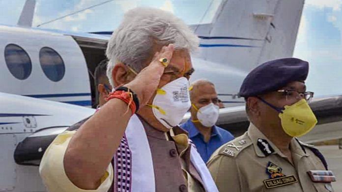 BJP leader and former telecom minister Manoj Sinha gestures as he arrives in Srinagar after being appointed as the new governor of J&K, in Srinagar, Thursday | PTI