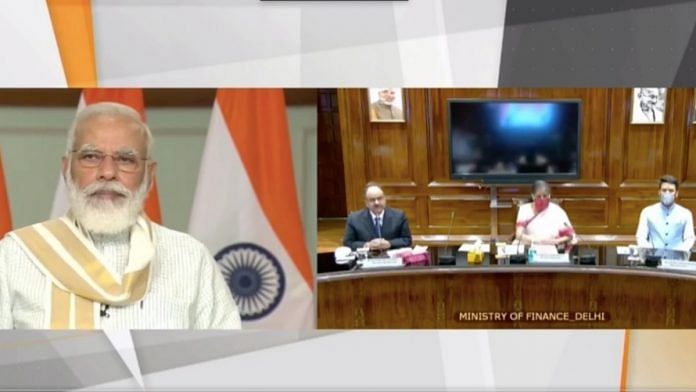 Prime Minister Narendra Modi, Finance Miniter Nirmala Sitharaman and other officials at the online launch of “Transparent Taxation – Honoring the Honest