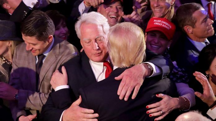 File photo of Robert Trump hugging Donald Trump in 2016