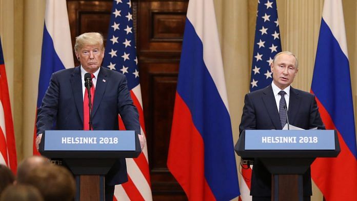 File photo of Donald Trump and Vladimir Putin during a news conference in Helsinki, Finland, on 16 July 2018