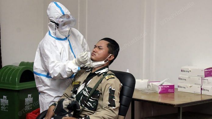 A policeman was being tested for coronavirus at the Delhi Assembly | Photo: Suraj Singh Bisht | ThePrint