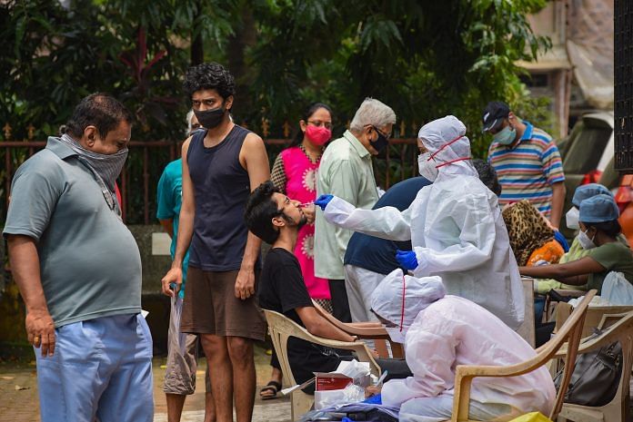A medic collects a nasal sample from a resident via Rapid Antigen kit for Covid-19 test, at Borivali in Mumbai Sunday, 6 September 2020 (representative image) | PTI