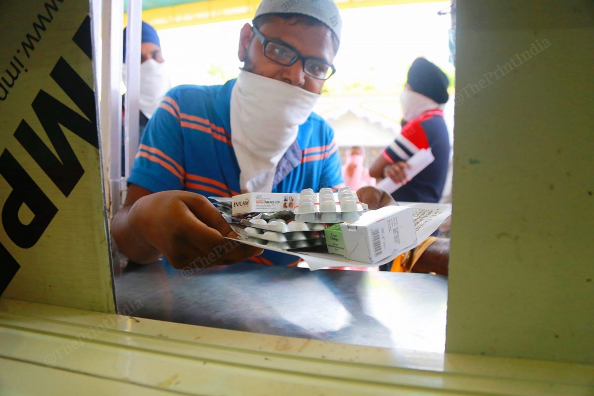 A Muslim man buys medicine | Photo: Manisha Mondal | ThePrint