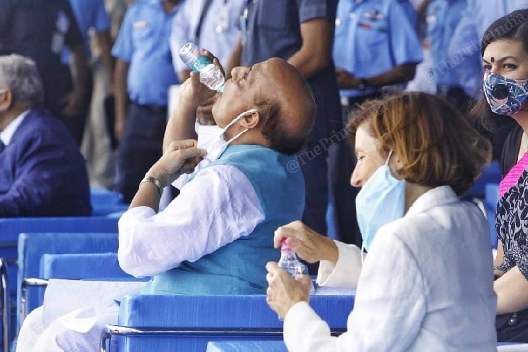 Defence Minister Rajnath Singh drinking water during the function | Photo: Praveen Jain | ThePrint