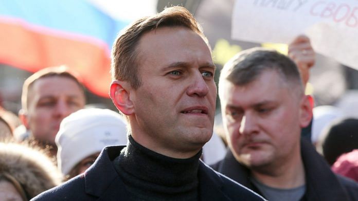 Alexey Navalny, Russian opposition leader, walks with demonstrators during a rally in Moscow, Russia in 2019. | Bloomberg