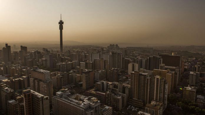 The Hillbrow Tower, operated by Telkom SA SOC Ltd., left, stands on the city skyline at dusk in Johannesburg, South Africa (Representational image) | Photographer: Guillem Sartorio/Bloomberg