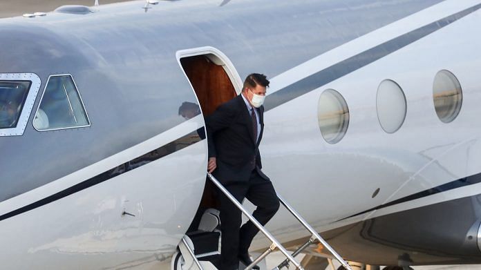 Keith Krach, US Undersecretary of State for Economic Growth, Energy and the Environment, alights from an aircraft after landing at the Sungshan airport in Taipei. | Photographer: Pei Chen| AFP / Getty Images via Bloomberg