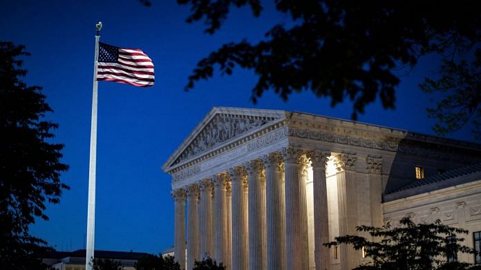 An American flag flies outside the U.S. Supreme Court in Washington, D.C. | Bloomberg