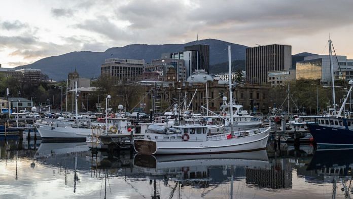 The fishing vessels are moored by the city centre, in Hobart, Tasmania on 21 September | Bloomberg