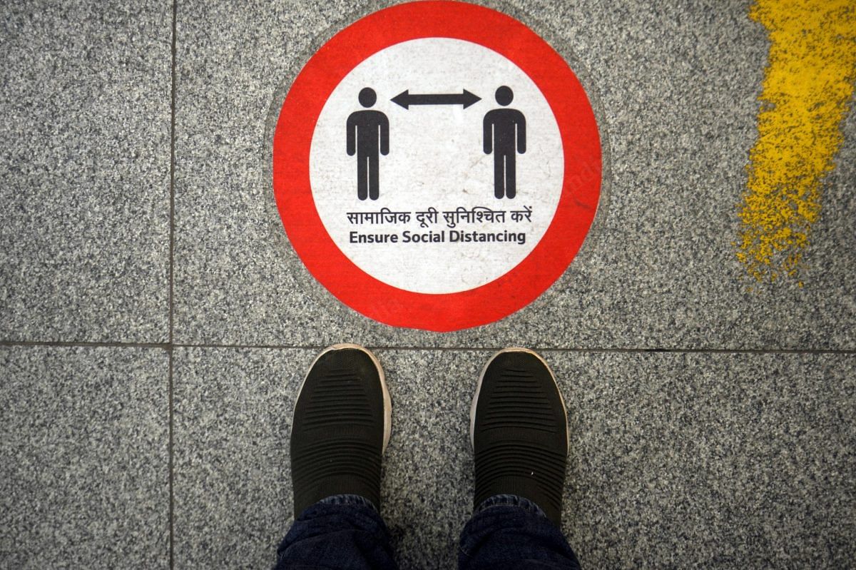 Social distancing stickers are pasted on the floor of the metro station | Photo: Suraj Singh Bisht | ThePrint