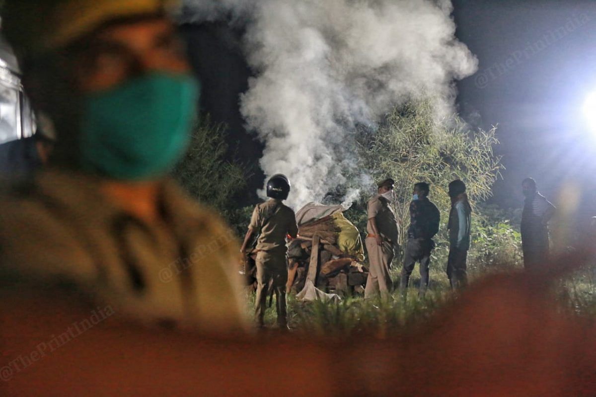 With no family members around the Uttar Pradesh police cremates the body | Photo: Manisha Mondal | ThePrint
