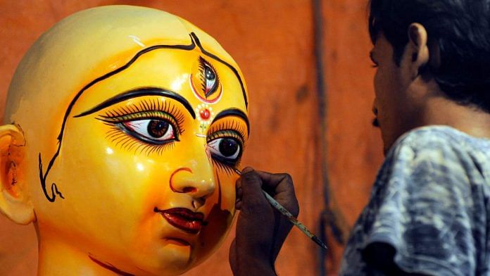 Representative image | An artist giving finishing touch on a clay idol of Goddess Durga at Kumartuli in Kolkata | Photo: ANI