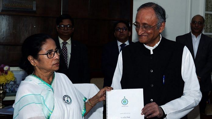 File image of West Bengal Chief Minister Mamata Banerjee and Finance Minister Amit Mitra | Photo: ANI