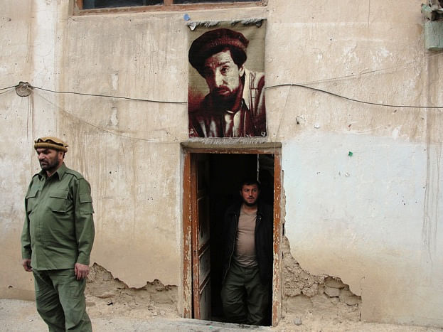 A portrait of Ahmad Shah Massoud at a checkpoint in the Panjshir Valley | wikimedia commons