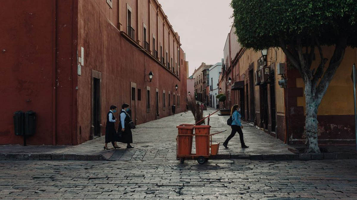 Nuns wearing protective masks walk along a street in Queretaro, Mexico | Bloomberg