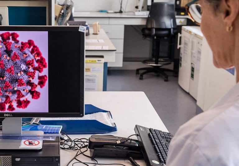 Coronavirus can sometimes spread indoors in air beyond 6 ft, US CDC says