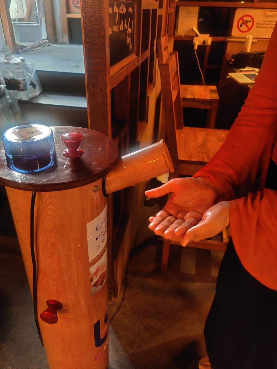 A hands-free sanitisation device at My Bar, CP | Bismee Taskin | ThePrint