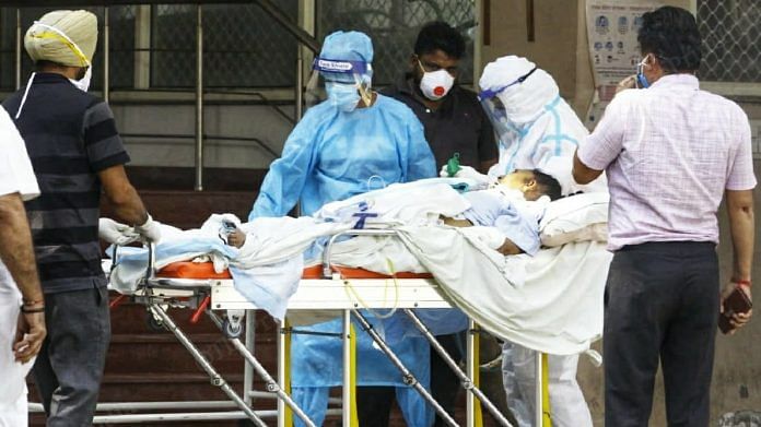 A critical Covid-19 patient being brought to the Covid-19 ward at Rajindra Hospital, a tertiary healthcare institute in Punjab | Photo: Pravin Jain