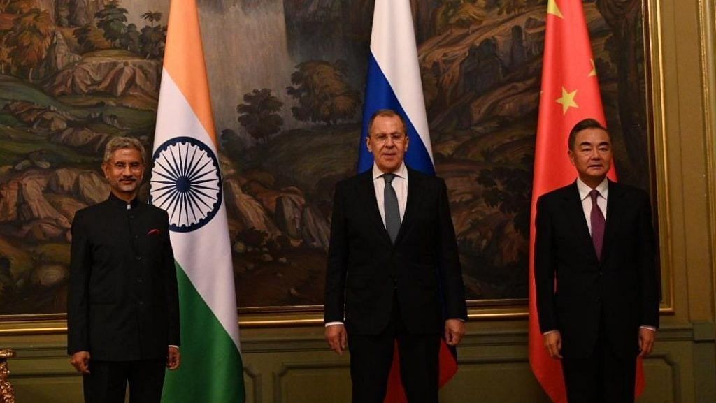 External Affairs Minister Dr. S Jaishankar with his Russian and Chinese counterparts Sergei Lavrov (C) and Wang Yi (R) during the meeting of the Foreign Ministers of the Shanghai Cooperation Organization, in Moscow on Thursday. | ANI