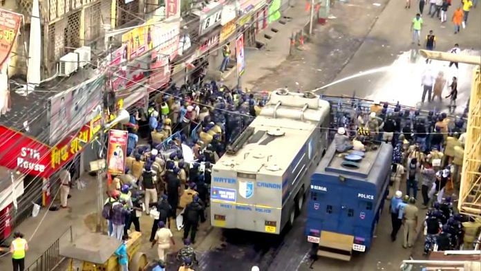 Police in Kolkata use water cannons to disperse a BJP protest Thursday against the alleged killings of party members in Bengal | PTI