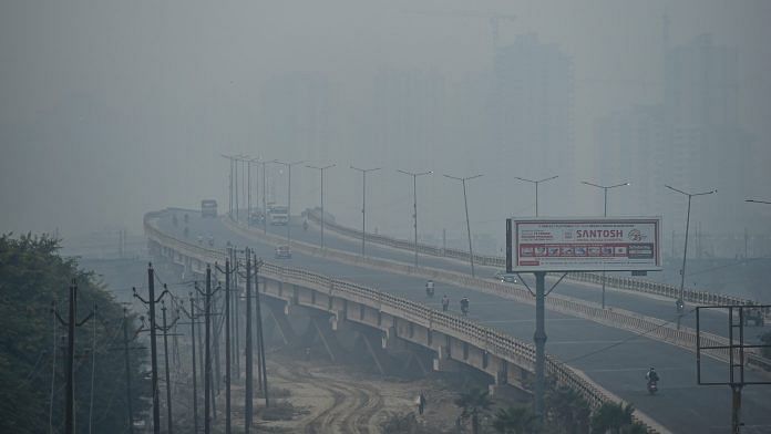 Vehicles ply on a street, amid hazy weather conditions, in Ghaziabad, Wednesday, 28 October, 2020 | PTI