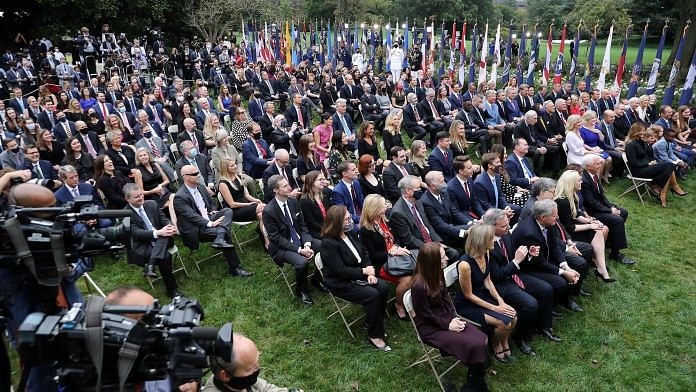 Guests watch as Donald Trump introduces Amy Coney Barrett as his nominee to the Supreme Court in the Rose Garden at the White House on 26 September | Bloomberg