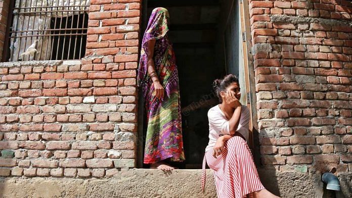 Brahmin women at a house in Boolgarhi village, Hathras | Photo: Manisha Mondal | ThePrint