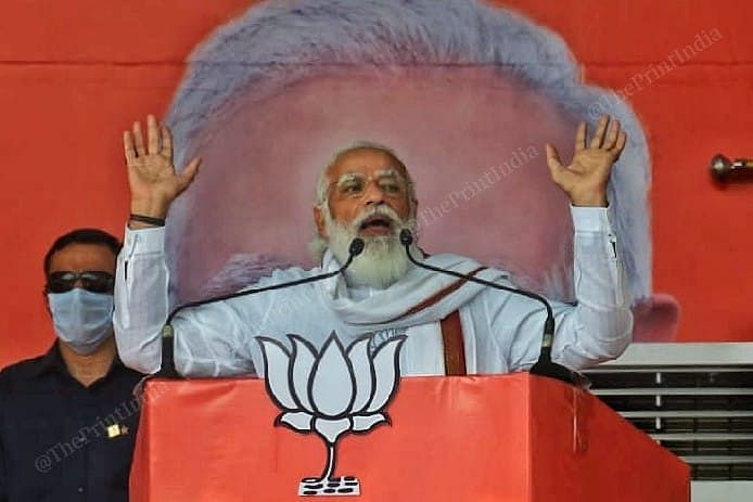 Narendra Modi seemed delighted to see the massive turnouts at the rallies and, on more than one occasion, had to halt his speech and request enthusiastic supporters to stop chanting 'Modi, Modi' and quietly take their seats | Praveen Jain | ThePrint